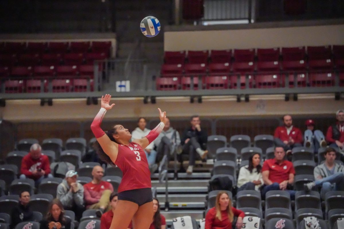 WSU Outside Hitter Eliana Ti'a leaps to serve the ball against University of Idaho, April 25, 2026.