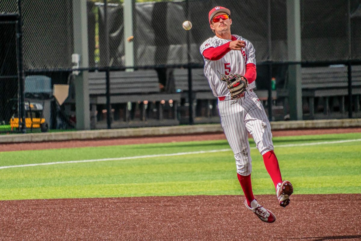 WSU Shortstop Kyler Northrop sends the ball to first base against Gardner-Webb University, April 11, 2026.
