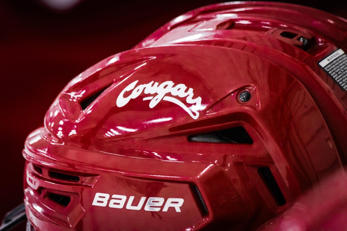 A Cougar hockey helmet shining under the lights during their prospect camp April 10 and 11, 2026. 