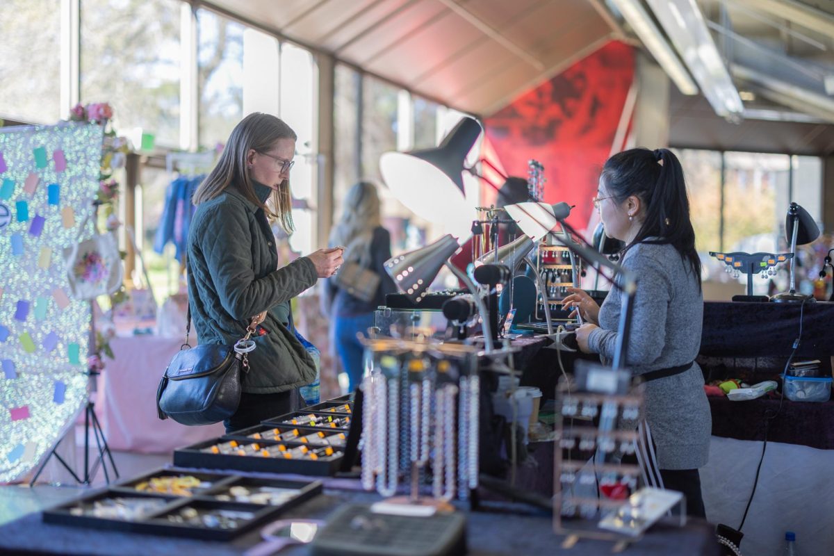 Vendors and customers at the Spring Family Arts and Crafts Fair in Beasley Coliseum, April 17, 2026.
