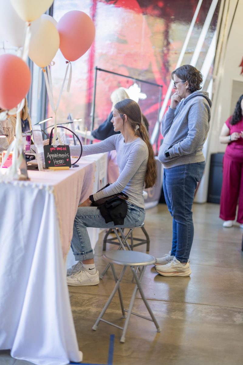 Vendors and customers at the Spring Family Arts and Crafts Fair in Beasley Coliseum, April 17, 2026.