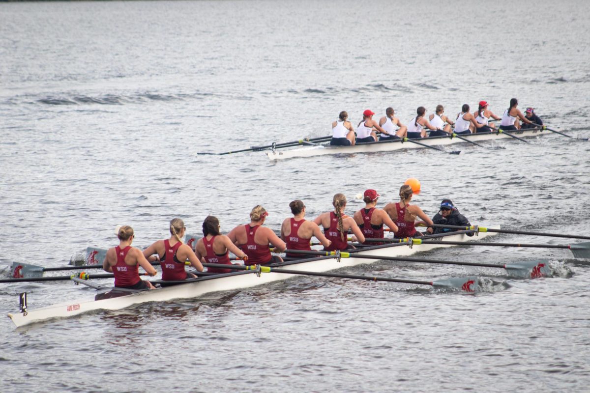 The WSU eight boat leads the Gonzaga boat at the Fawley Cup at Wawawai Landing on April 11, 2026.