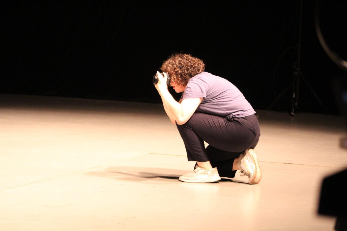Evergreen Editor-in-Chief Lucille Stutesman isn't afraid to get down on one knee for a story — just like how she isn't afraid to talk about her gender identity with strangers.