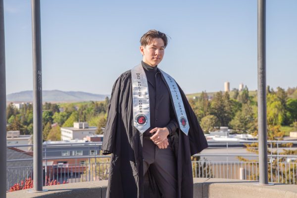 Lightroom and police cars: longtime Evergreen photo editor graduates