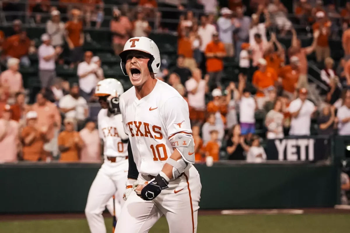 Kimble Schuessler hyping up his dugout during a game with the University of Texas Longhorns (Courtesy of University of Texas Athletics).  